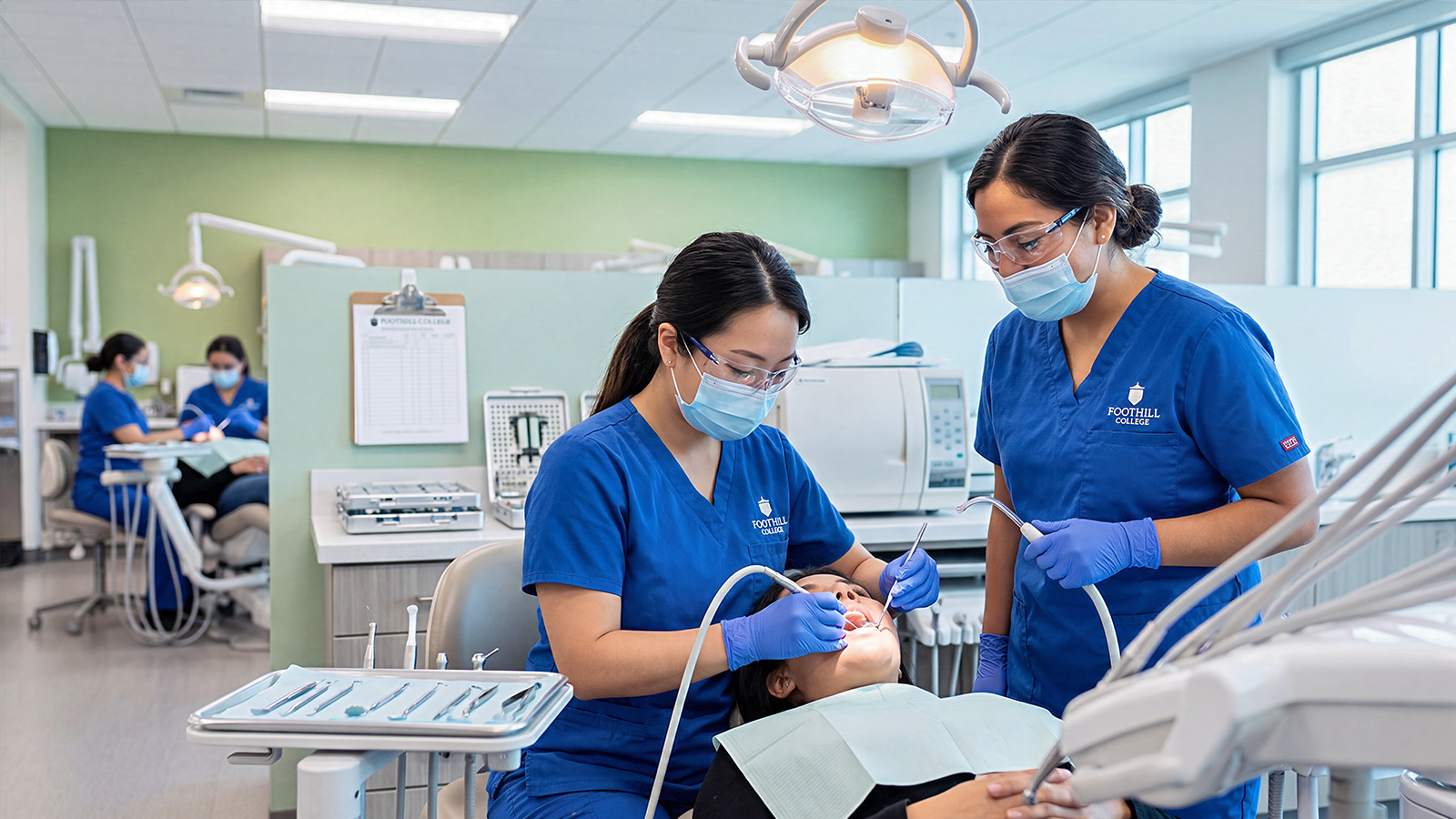 Students in a dental hygiene clinic practicing patient care, using clinical tools under supervision.