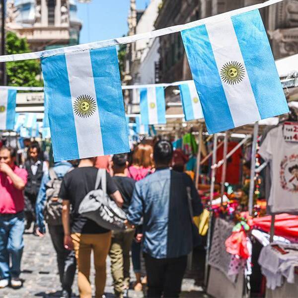 Buenos Aires street with flags hung all around