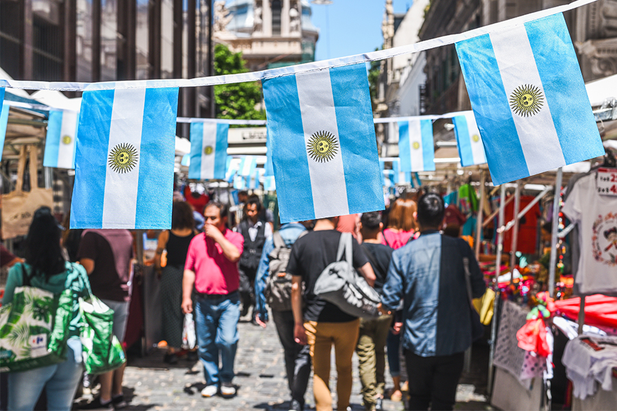 Buenos Aires street with flags hung all around