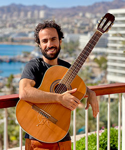 Meet Lior Ben Haur (holding a guitar)