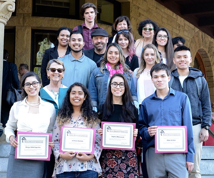Honors Institute Students showcasing their degrees