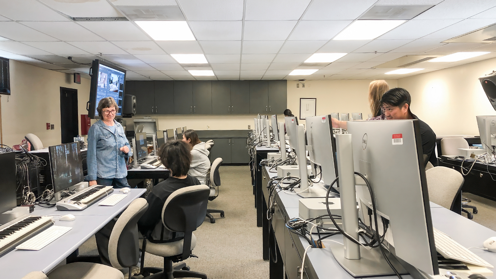 IDEA lab with computers and keyboards for digital composition.