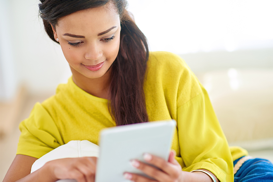 Female student searching on an ipad