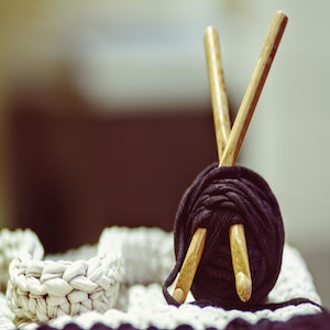 Ball of yarn and knitting needles 