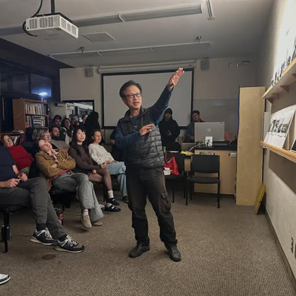 Profesor teaching in a photography class