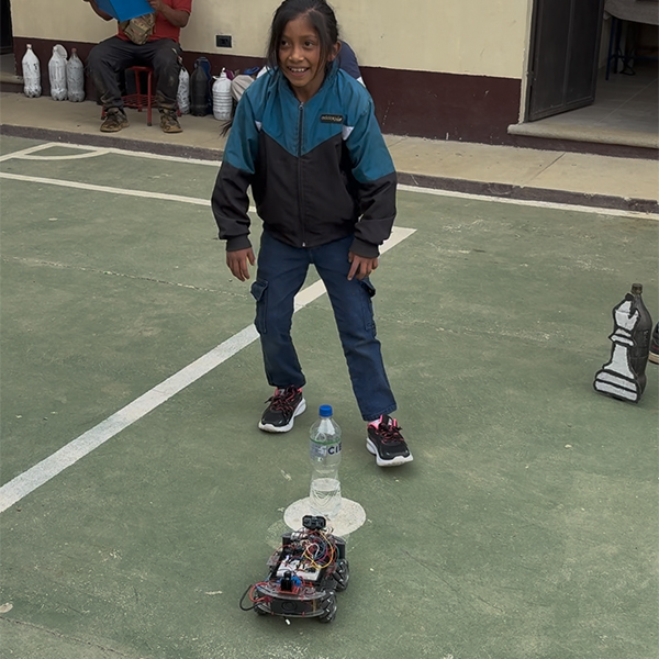 Guatemala Trip - Child playing with a robot