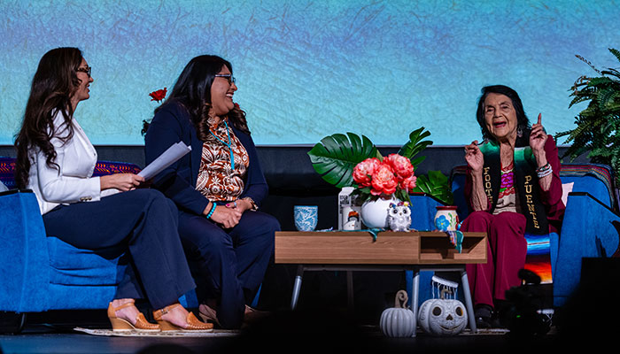 Stage with three women