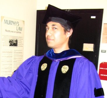 David wearing doctoral robes