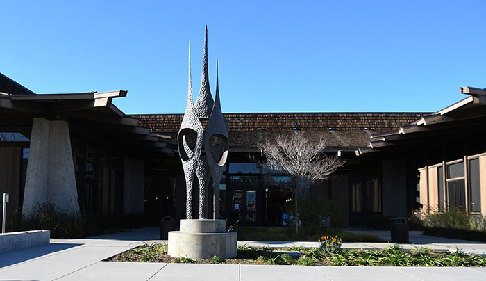 library exterior building with sculpture